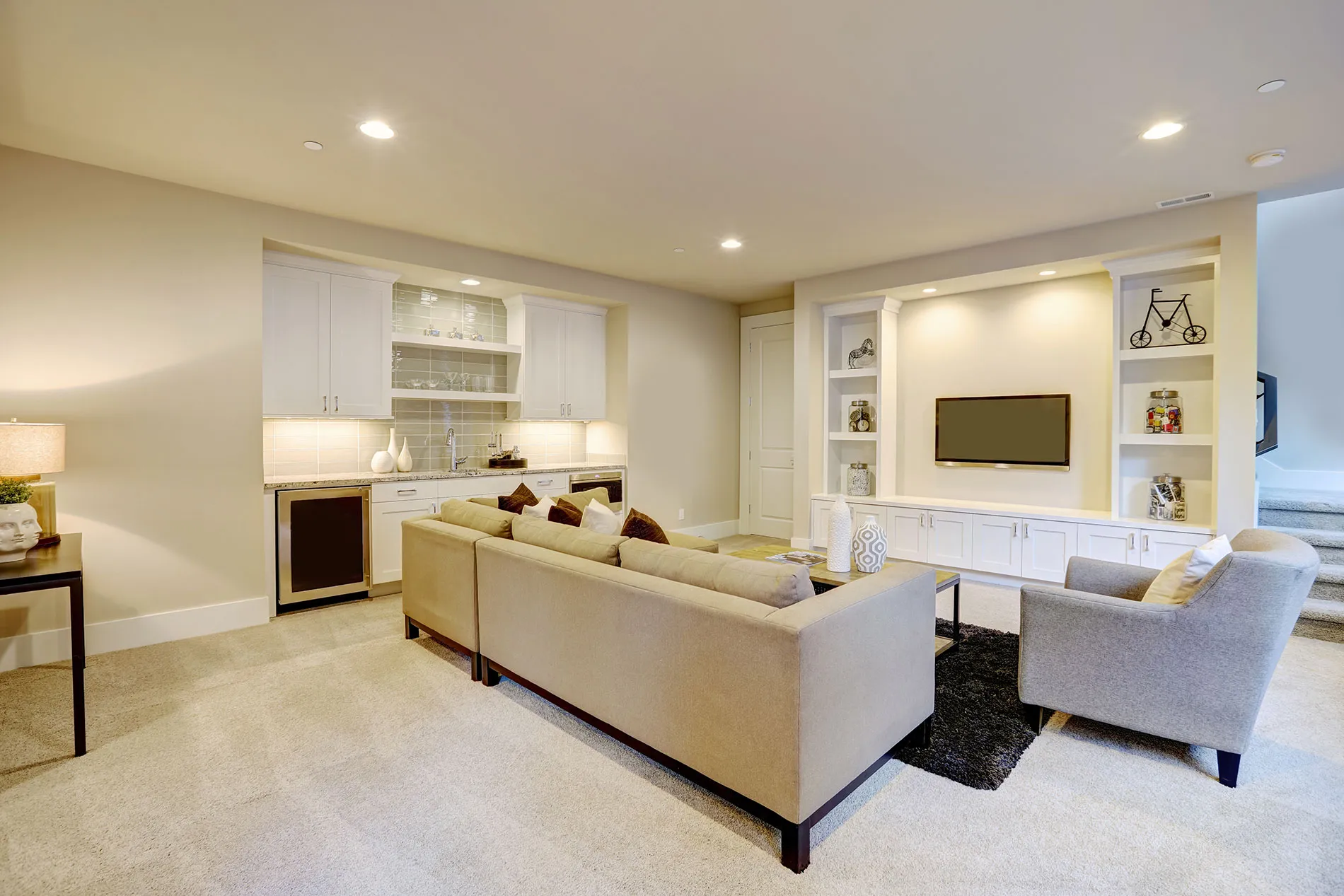 A living room filled with furniture and a flat screen tv.