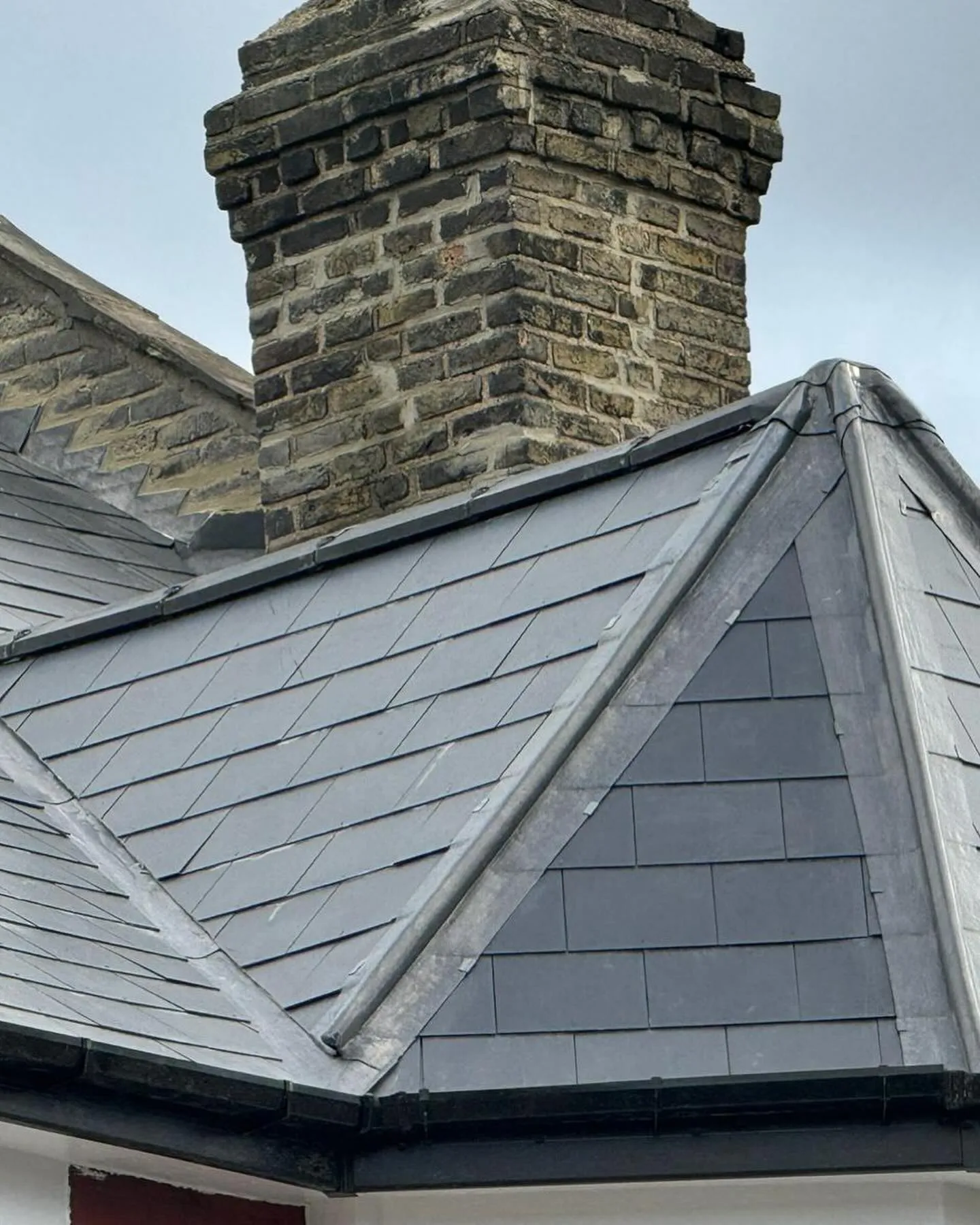 A brick chimney on top of a building.